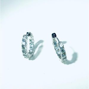 Beautiful hoop earrings sterling silver with hand cut and handset CZs